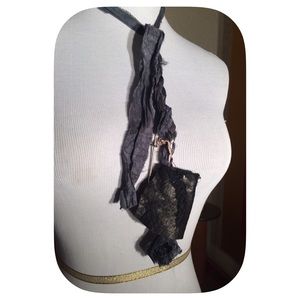 Distressed glove leather and safety pin pendant